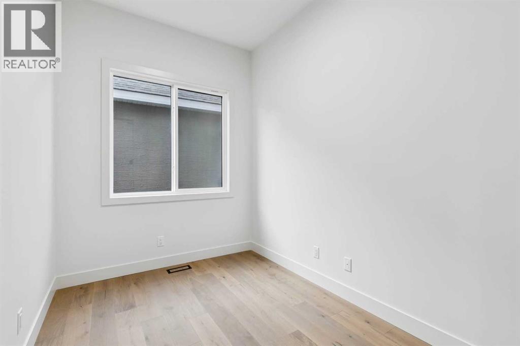 148 Marina Grove, Calgary, Alberta T3M 3S9 - Photo 13 - A2272153