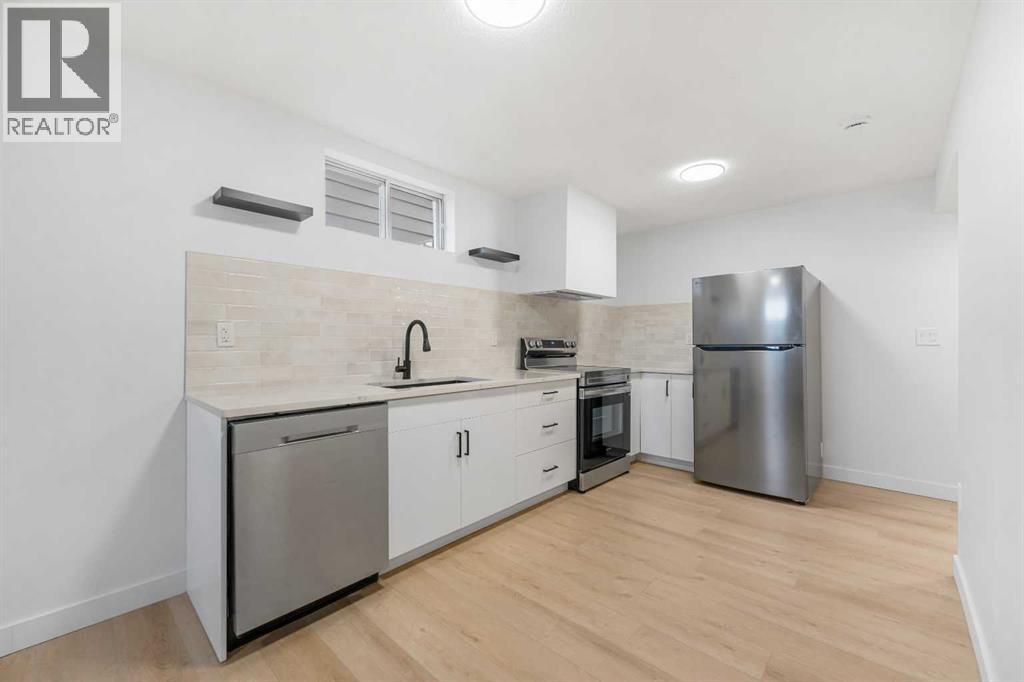 966 Berkley Drive Nw, Calgary, Alberta  T3K 1A2 - Photo 39 - A2274096