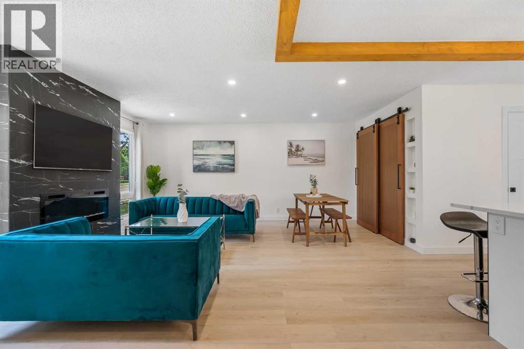 966 Berkley Drive Nw, Calgary, Alberta  T3K 1A2 - Photo 6 - A2274096