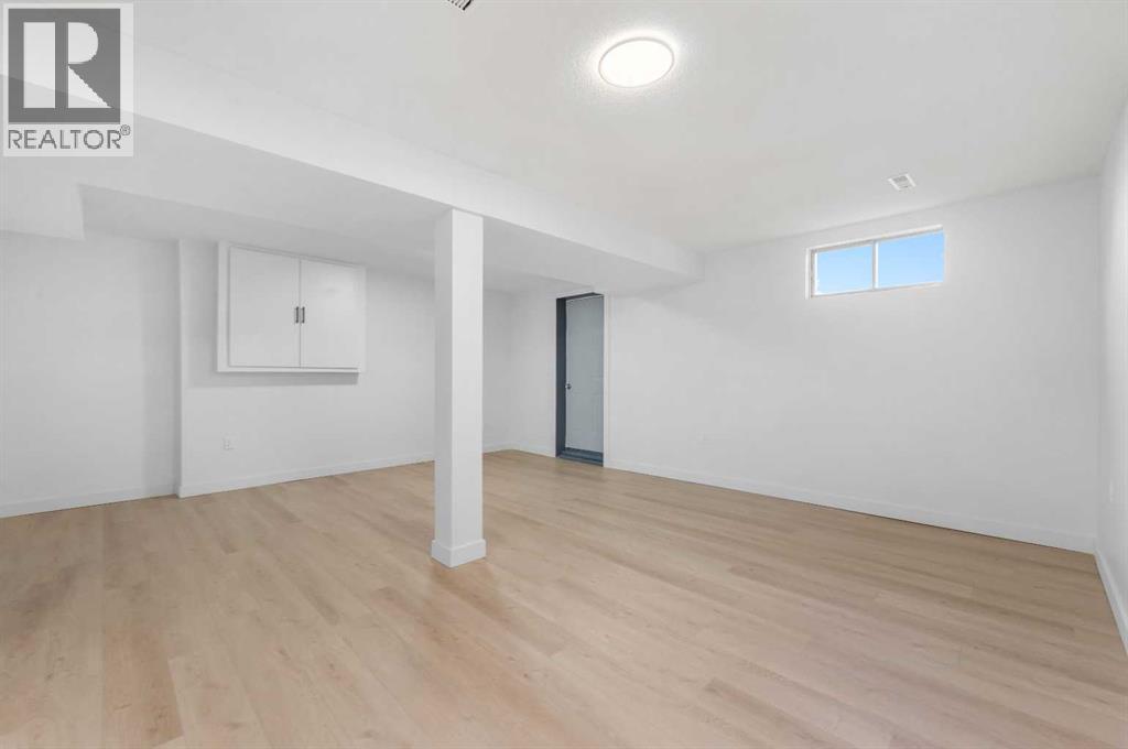 966 Berkley Drive Nw, Calgary, Alberta  T3K 1A2 - Photo 37 - A2274096