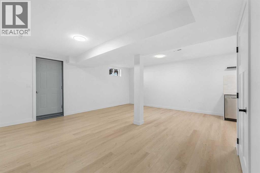 966 Berkley Drive Nw, Calgary, Alberta  T3K 1A2 - Photo 35 - A2274096