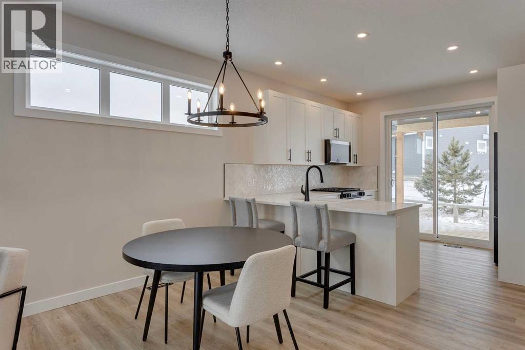 105 Cottageclub Drive, Rural Rocky View County, Alberta  T4C 1B1 - Photo 11 - A2266824