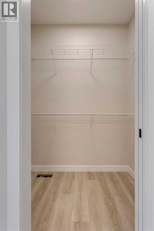 105 Cottageclub Drive, Rural Rocky View County, Alberta  T4C 1B1 - Photo 20 - A2266824