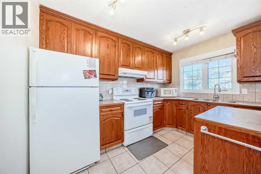 31 Castleglen Crescent Ne, Calgary, Alberta T3J 1N2 - Photo 6 - A2274099