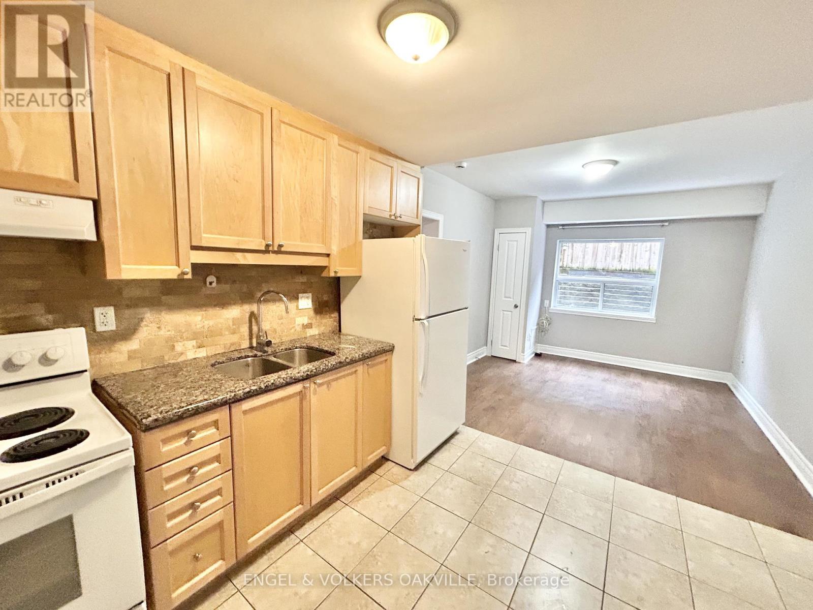 110 - 15 Thirty Third Street, Toronto, Ontario M8W 3G7 - Photo 2 - W12604032