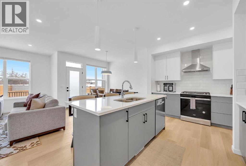 16 Magnolia Bay Se, Calgary, Alberta  T3M 3M9 - Photo 6 - A2274748