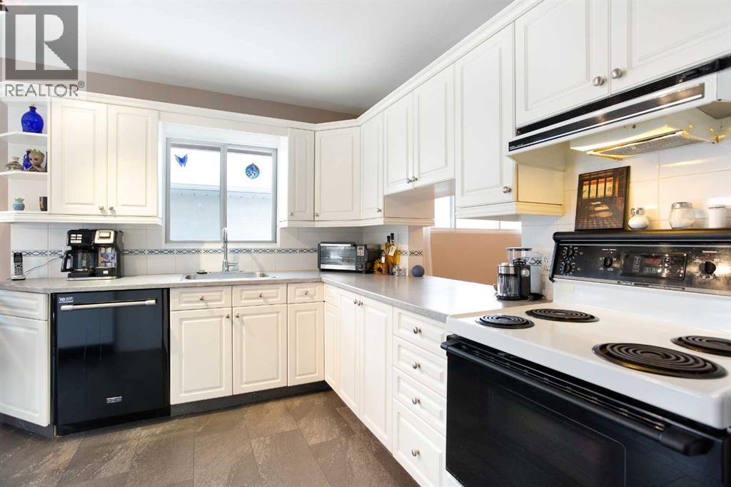 2607 Kelwood Drive Sw, Calgary, Alberta T3E 4A1 - Photo 12 - A2273154