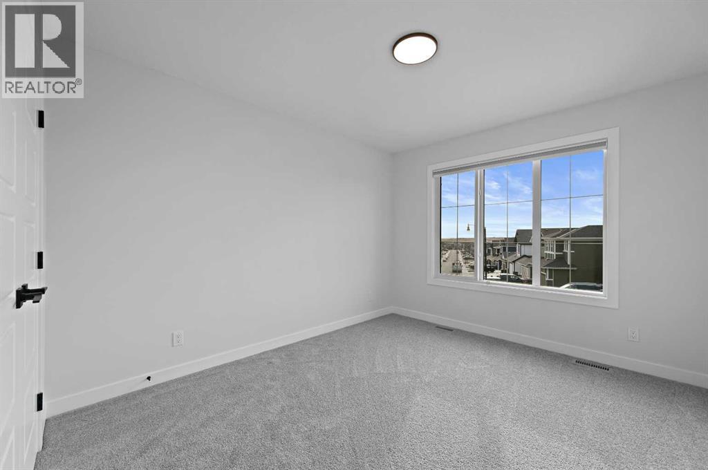 34 Ranchers View, Okotoks, Alberta  T1S 5R6 - Photo 34 - A2274198