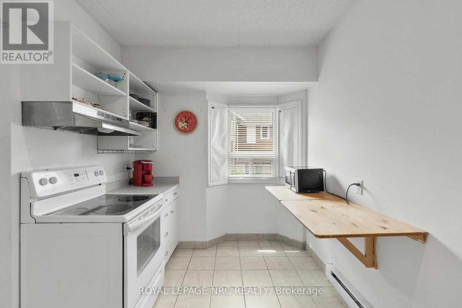 203 - 4872 Valley Way, Niagara Falls (Cherrywood), Ontario  L2E 1W3 - Photo 7 - X12631654