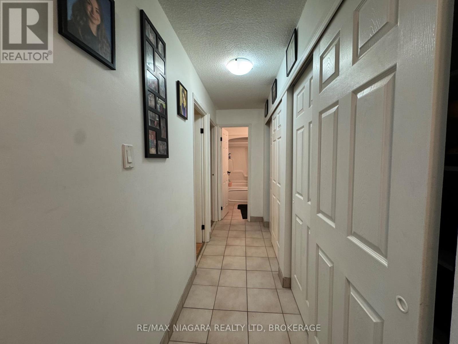 201 - 242 Oakdale Avenue, St. Catharines (Oakdale), Ontario  L2P 3K5 - Photo 12 - X12631694