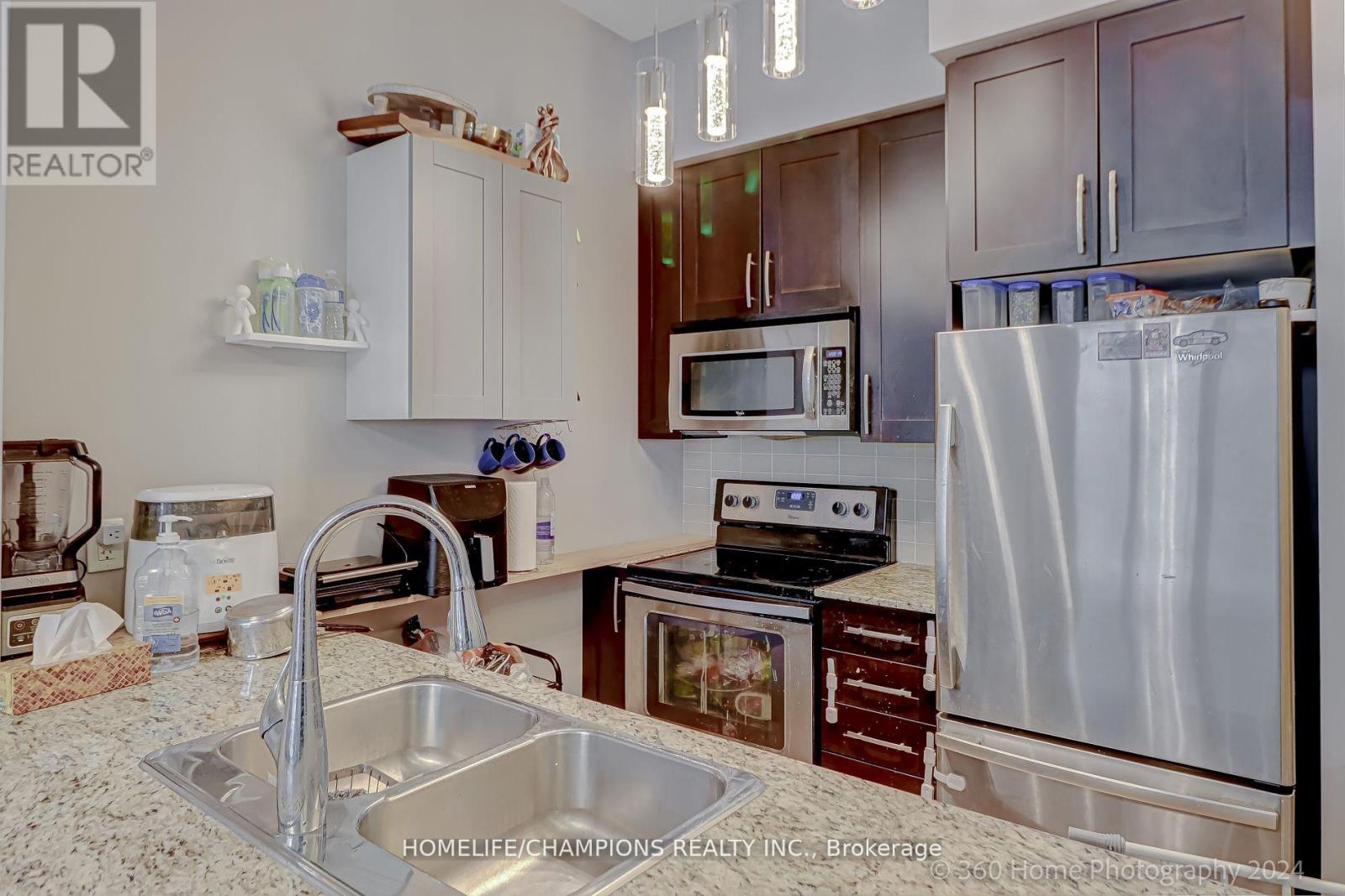 709 - 4070 Confederation Parkway, Mississauga (City Centre), Ontario  L5B 0E9 - Photo 6 - W12631862