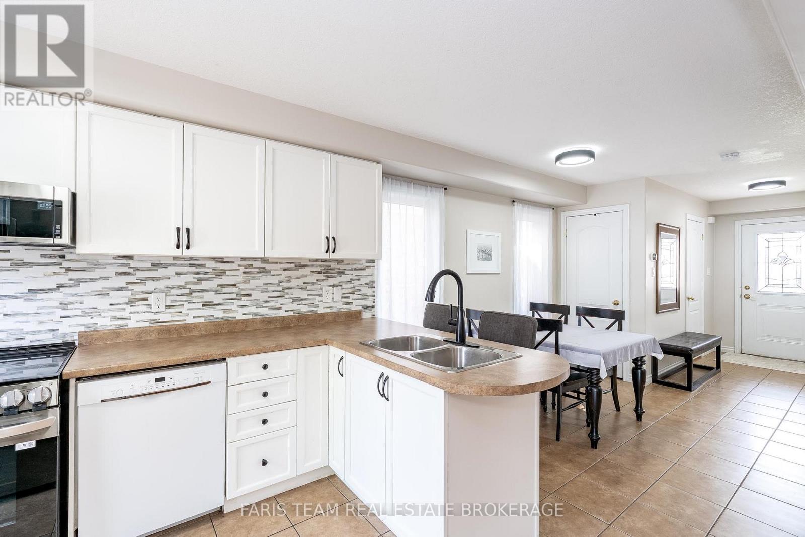 34 Quigley Street, Essa, Ontario  L0M 1B5 - Photo 6 - N12437163