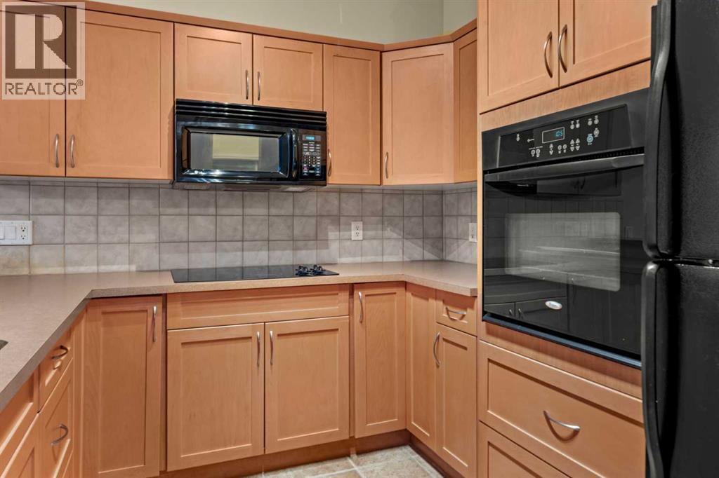 116 Tucker Circle, Okotoks, Alberta T1S 2J8 - Photo 7 - A2271009