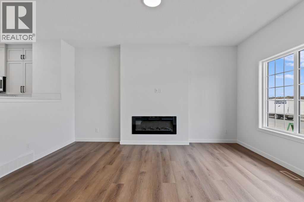 1029 Reynolds Crescent Sw, Airdrie, Alberta  T4B 5L8 - Photo 4 - A2200715