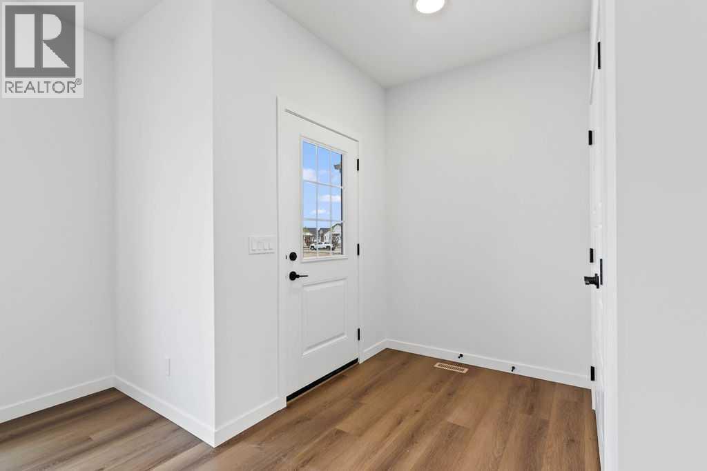 1029 Reynolds Crescent Sw, Airdrie, Alberta  T4B 5L8 - Photo 3 - A2200715