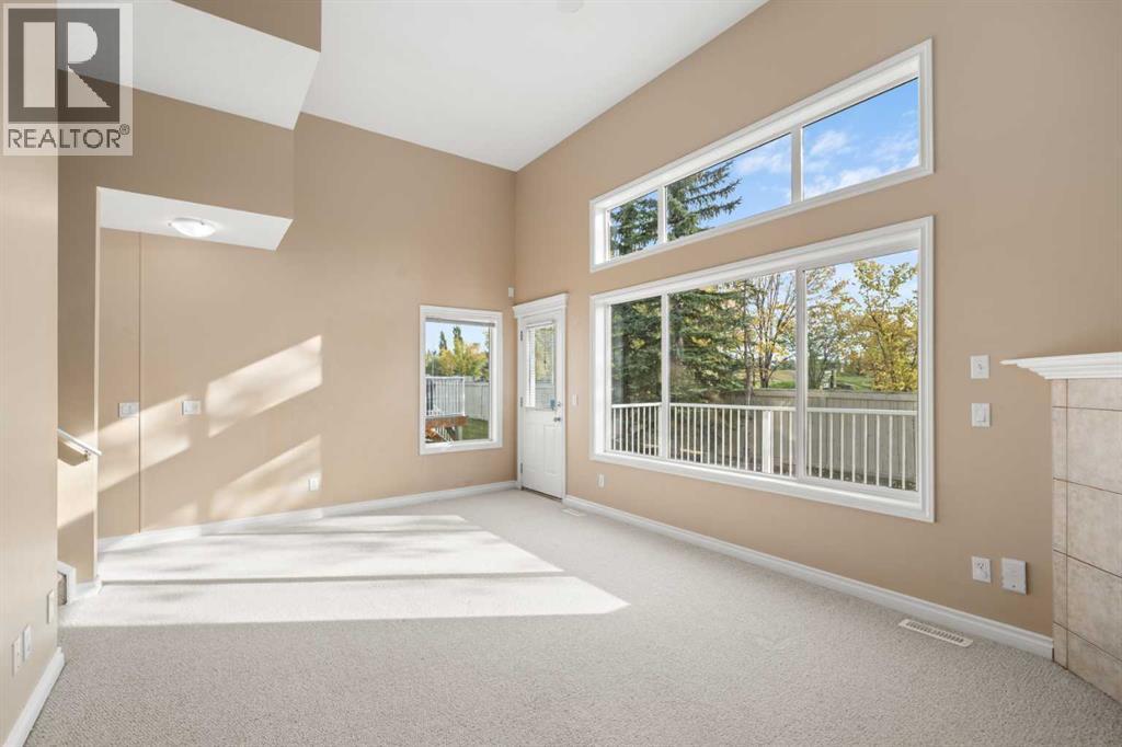 70 Crystal Shores Cove, Okotoks, Alberta  T1S 2B4 - Photo 7 - A2260860