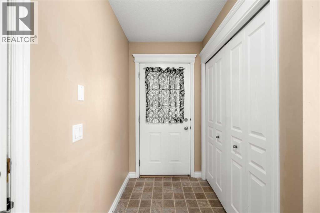 70 Crystal Shores Cove, Okotoks, Alberta  T1S 2B4 - Photo 2 - A2260860