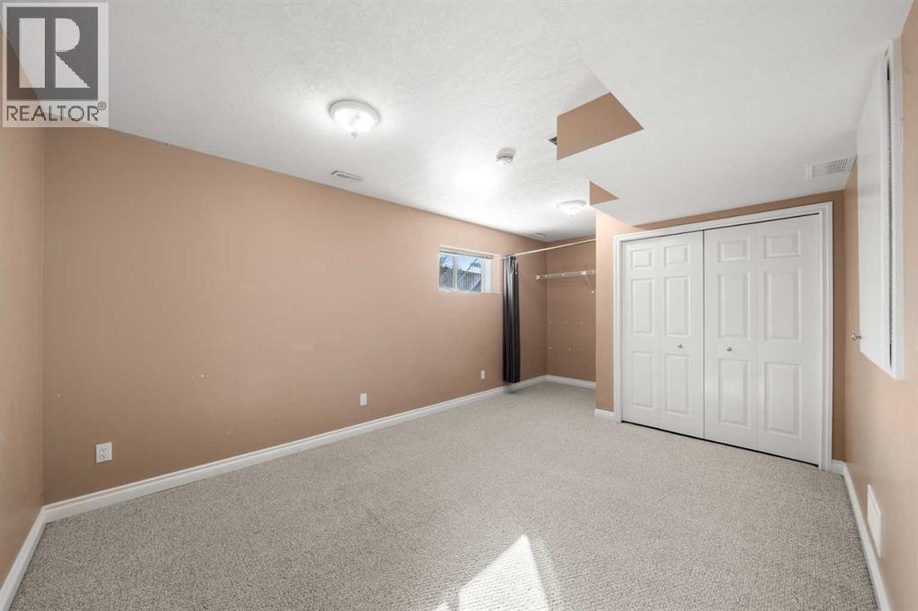 70 Crystal Shores Cove, Okotoks, Alberta  T1S 2B4 - Photo 20 - A2260860