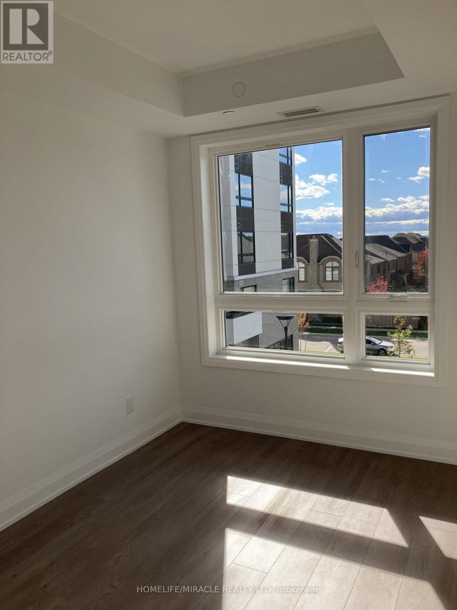 303 - 3250 Carding Mill Trail, Oakville, Ontario  L6M 5P7 - Photo 5 - W12632224