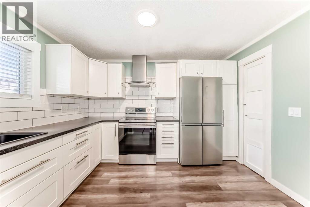 6808 26 Avenue Ne, Calgary, Alberta  T1Y 4N2 - Photo 8 - A2273703