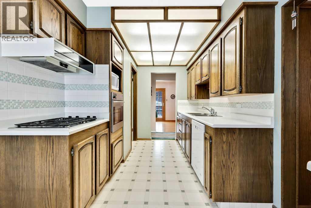 79 Chancellor Way Nw, Calgary, Alberta  T2K 1Y3 - Photo 19 - A2274614