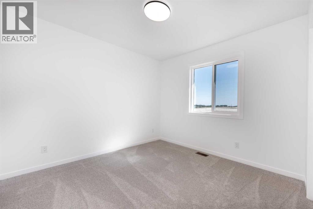 137 Clearwater Terrace, Chestermere, Alberta T1X 3A7 - Photo 31 - A2271578