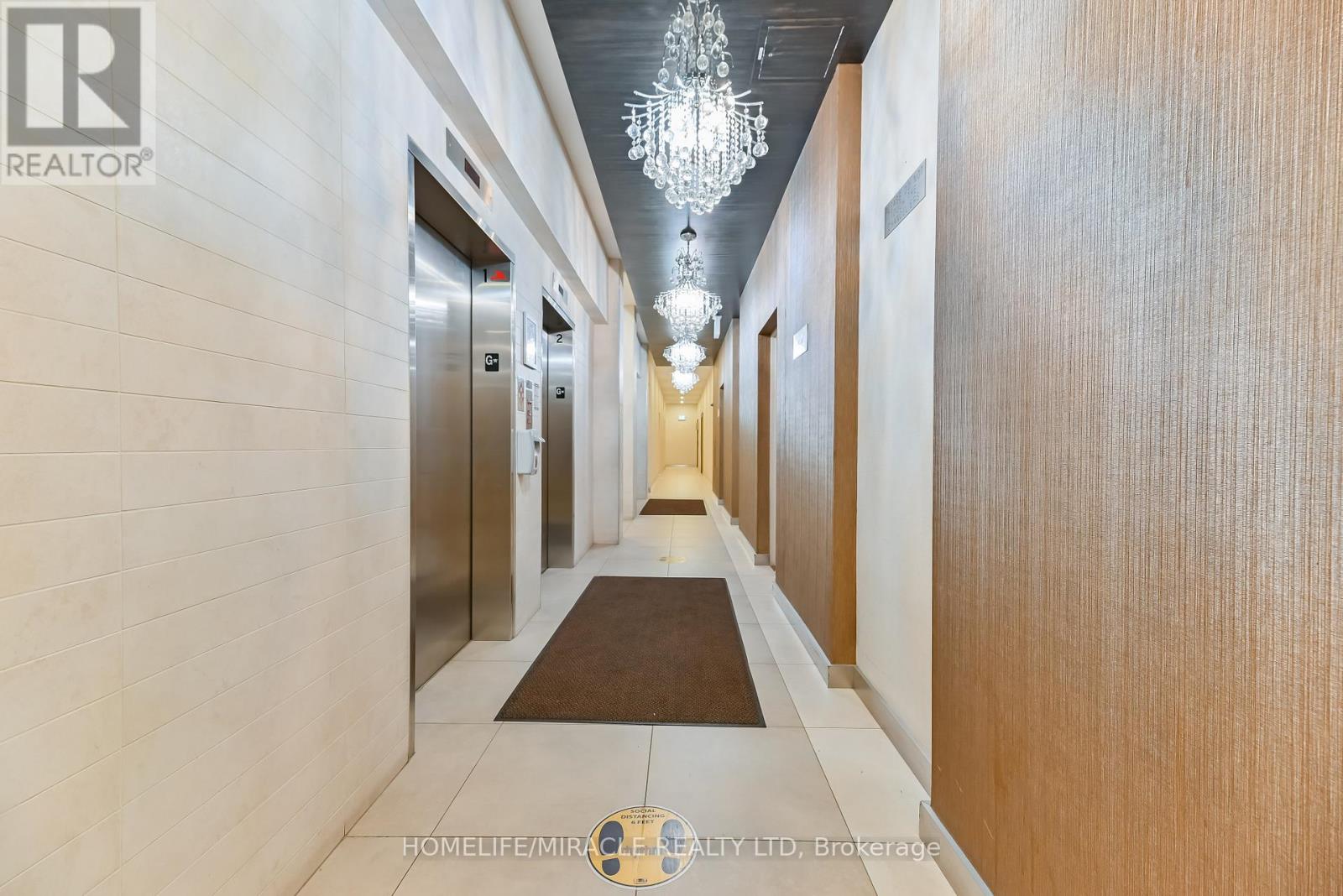 709 - 215 Queen Street E, Brampton, Ontario  L6W 0A9 - Photo 4 - W12632724