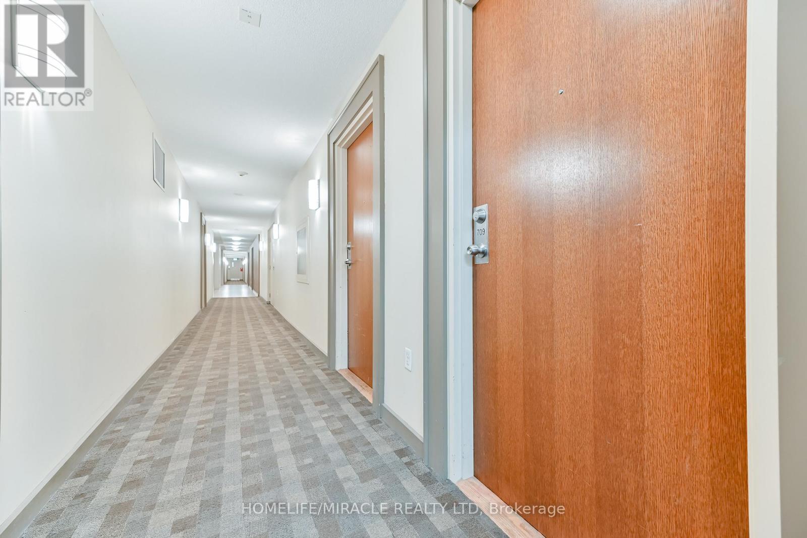 709 - 215 Queen Street E, Brampton, Ontario  L6W 0A9 - Photo 5 - W12632724