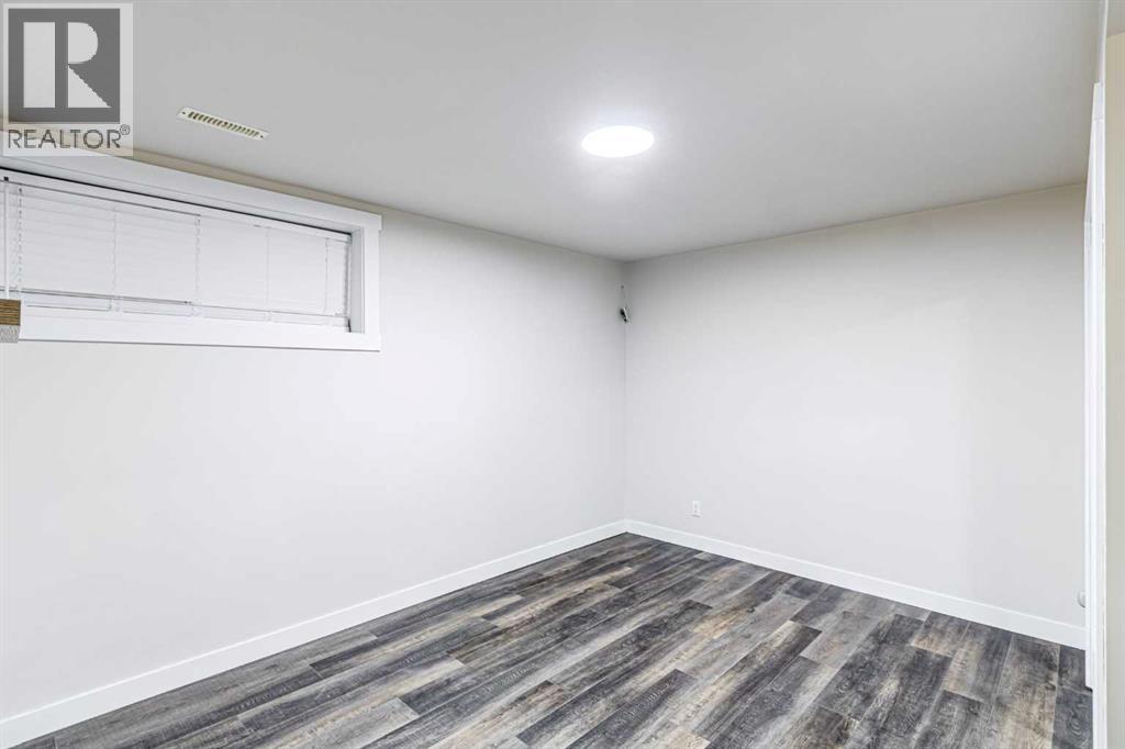 1430 Kings Heights Boulevard Se, Airdrie, Alberta  T4A 0A1 - Photo 39 - A2266274