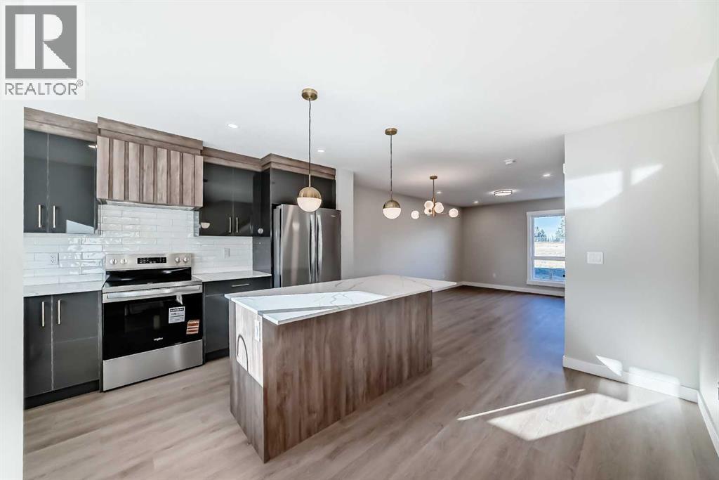 603 Clover Road, Carstairs, Alberta  T0M 0N0 - Photo 6 - A2269335