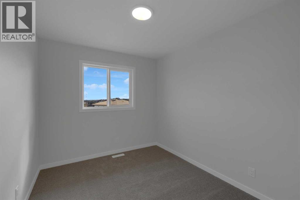 567 Carrington Boulevard Nw, Calgary, Alberta  T3P 2L8 - Photo 19 - A2262600
