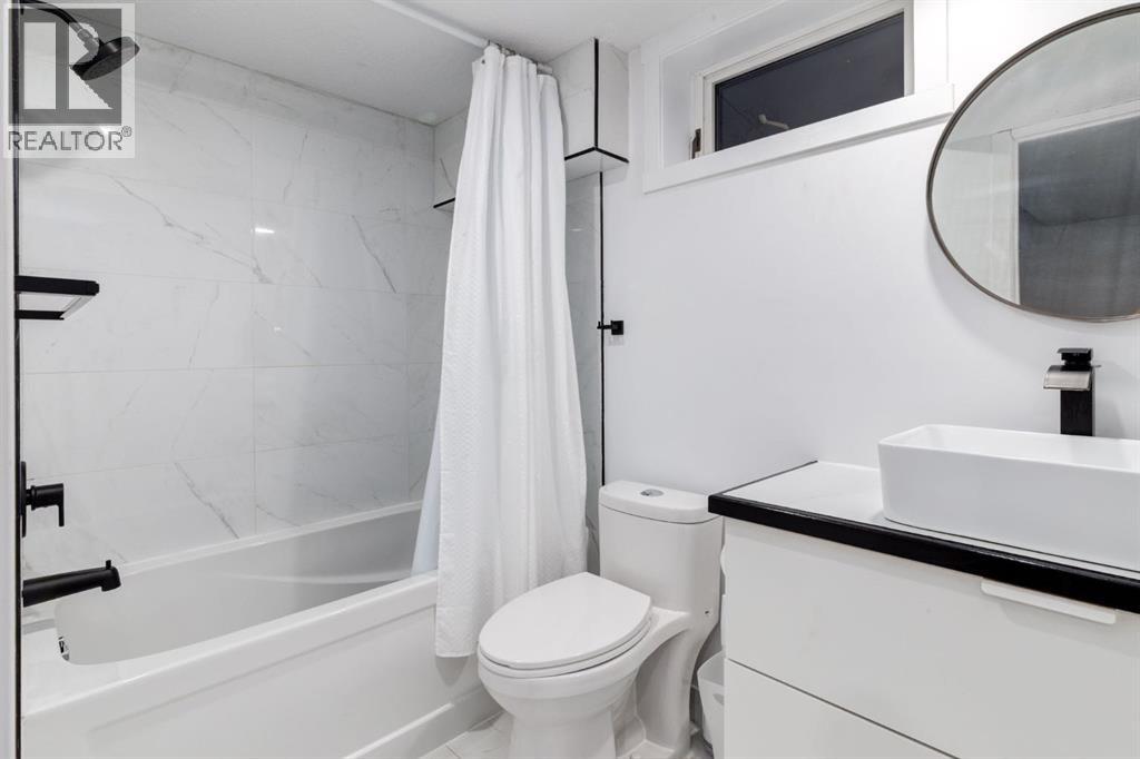 5 Sydney Drive Sw, Calgary, Alberta  T2W 0S7 - Photo 20 - A2269400