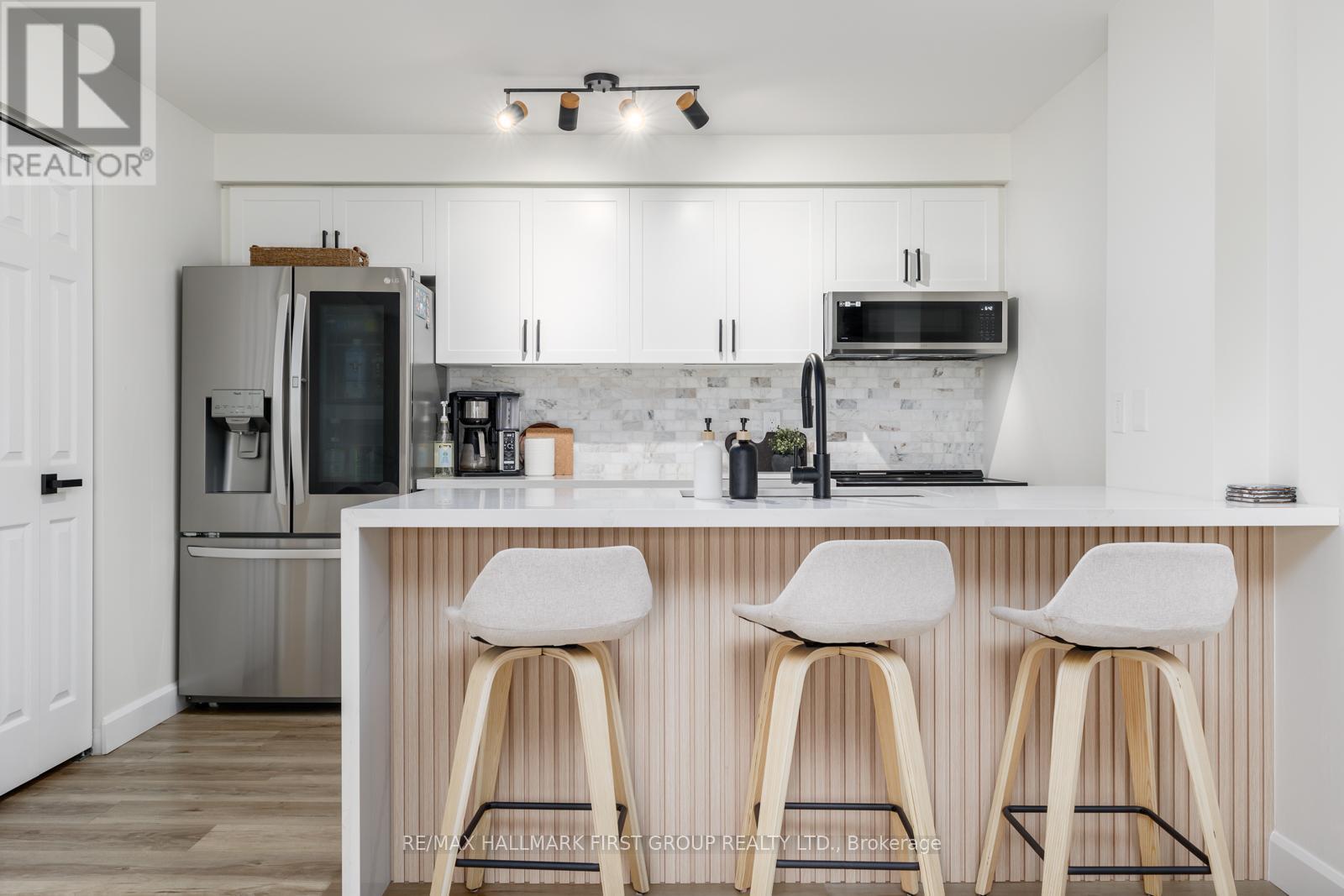 208 - 91 ASPEN SPRINGS DRIVE, Clarington, Ontario