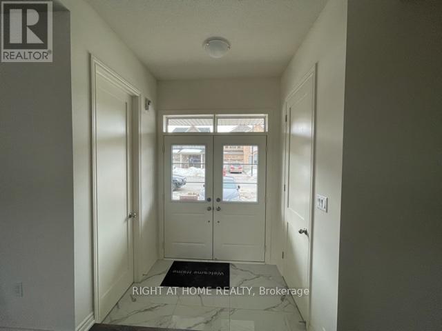 259 Clockwork Drive, Brampton, Ontario  L7A 5C7 - Photo 6 - W12633166