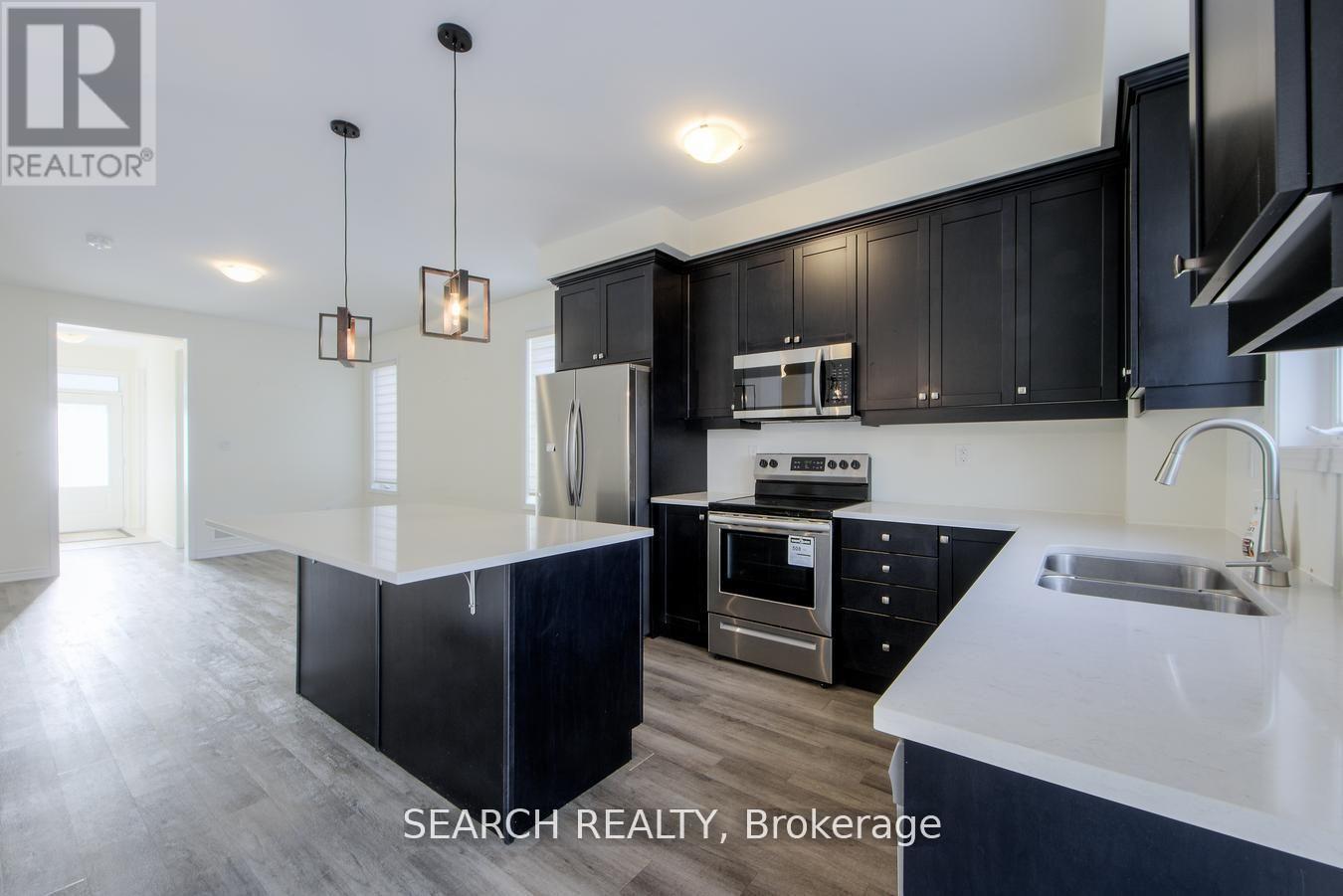 988 Cherry Court, Milton, Ontario  L9E 1P8 - Photo 3 - W12599936