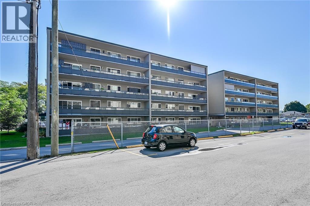 510 Queenston Road Unit# 404, Hamilton, Ontario  L8K 1J3 - Photo 2 - 40776905