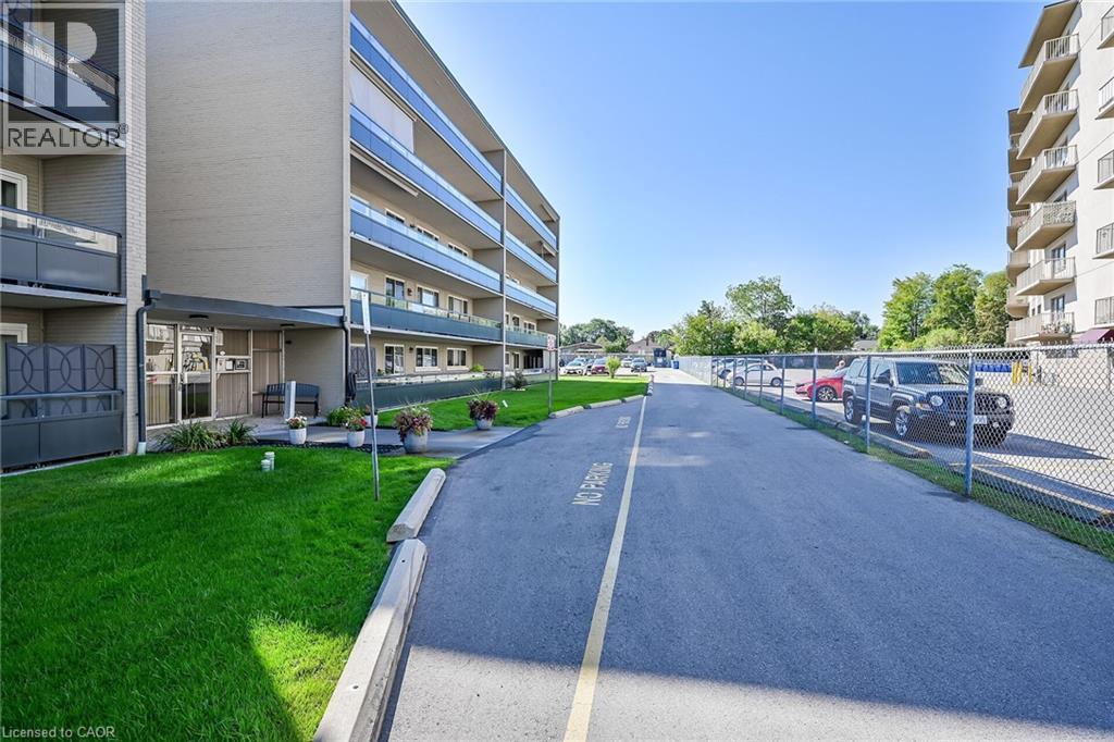 510 Queenston Road Unit# 404, Hamilton, Ontario  L8K 1J3 - Photo 3 - 40776905