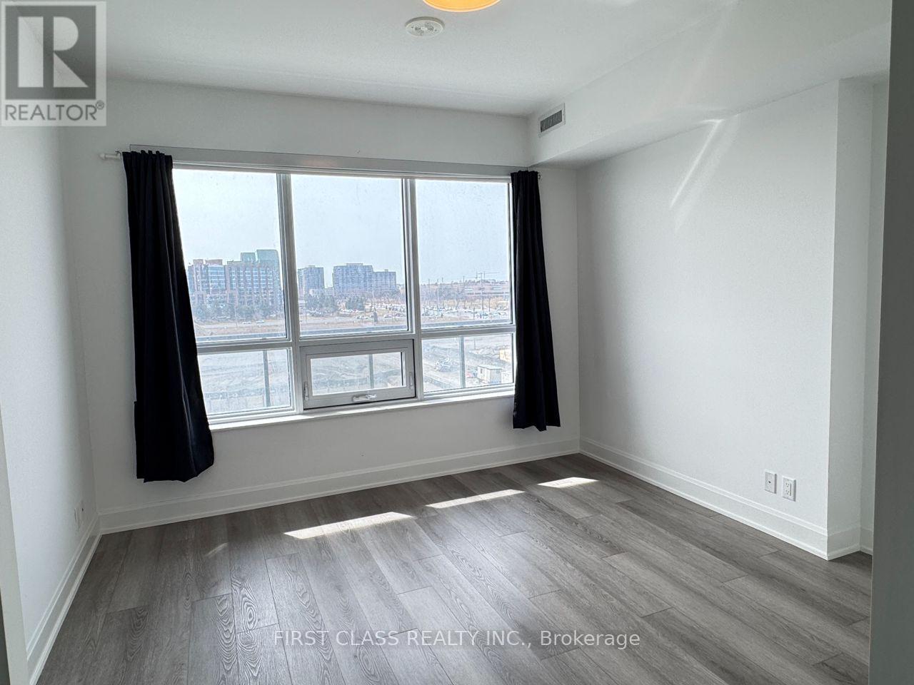 707 - 8 Water Walk Drive, Markham, Ontario  L3R 6L4 - Photo 12 - N12621416