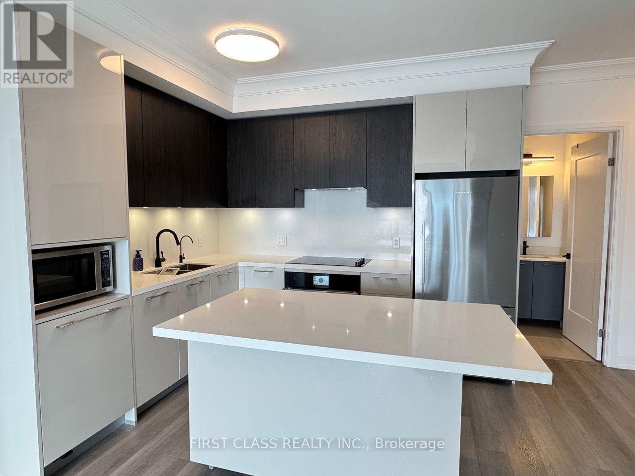 707 - 8 Water Walk Drive, Markham, Ontario  L3R 6L4 - Photo 10 - N12621416