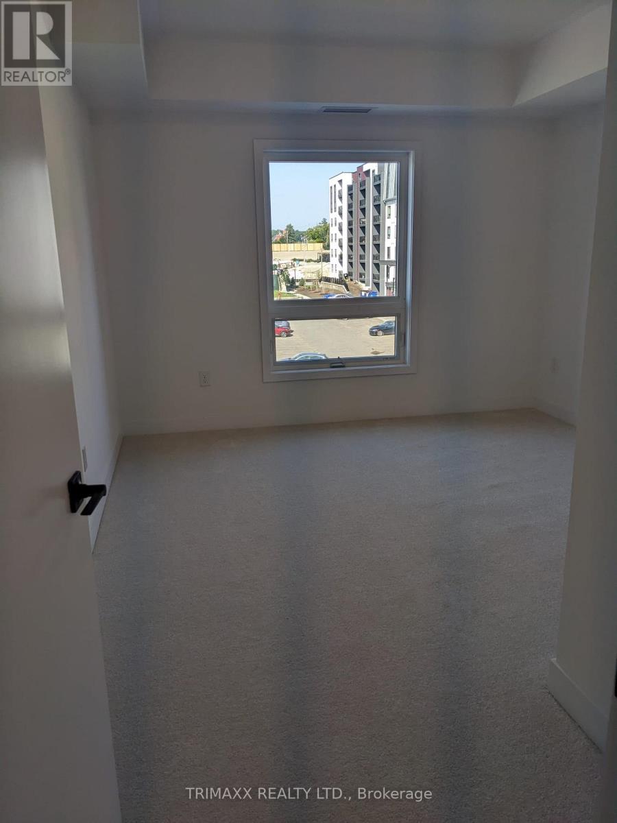 303 - 1 Chef Lane, Barrie (Innis-Shore), Ontario  L9J 0T1 - Photo 4 - S12633698