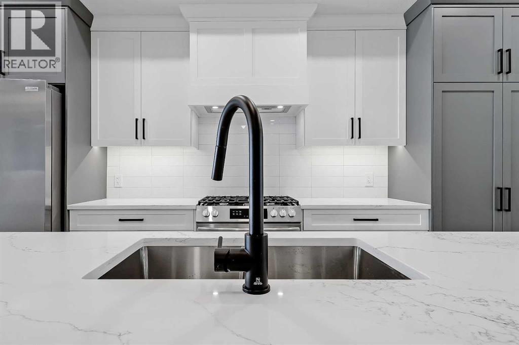 3806 1 Street Nw, Calgary, Alberta T2K 0W8 - Photo 7 - A2263181