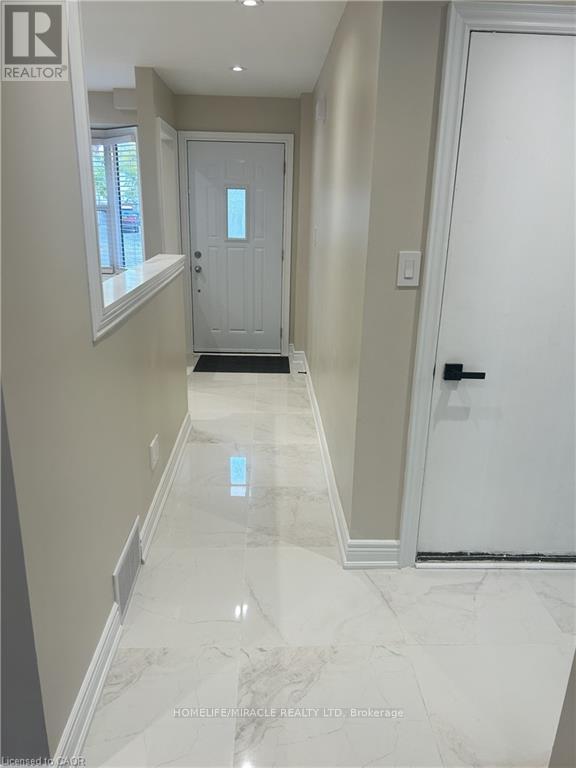 49 Ristau Crescent, Kitchener, Ontario  N2E 3A8 - Photo 3 - X12633974