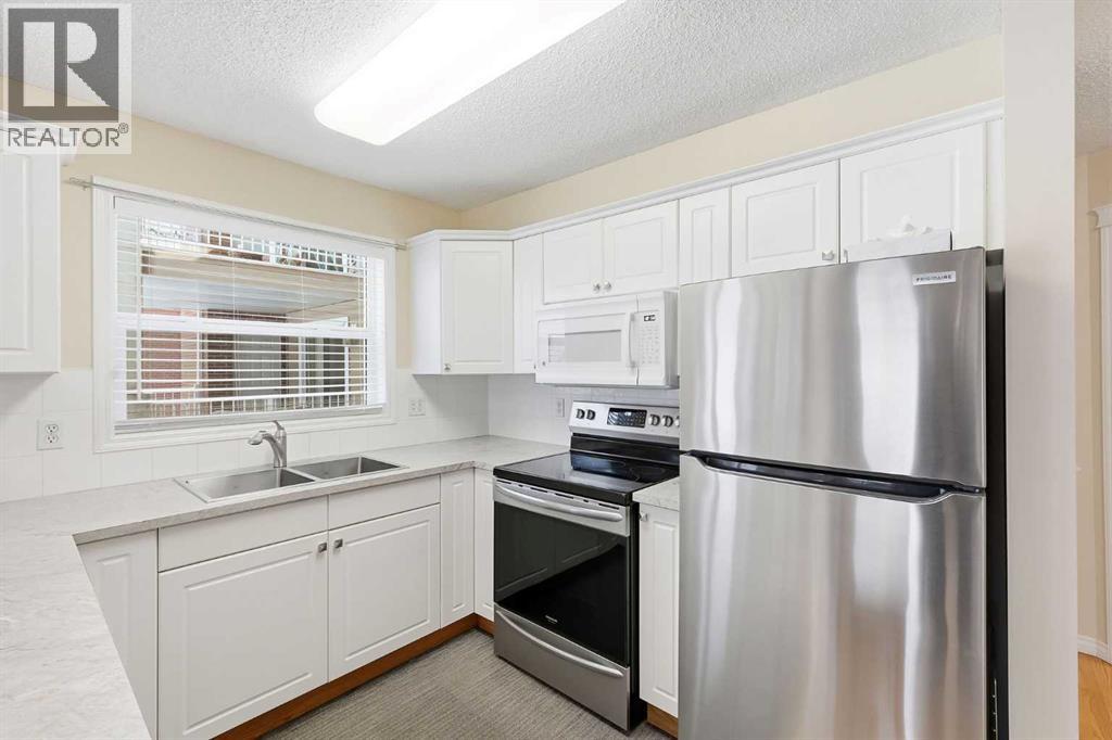 112, 6900 Hunterview Drive Nw, Calgary, Alberta  T2K 6K6 - Photo 7 - A2273856