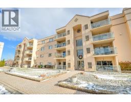 320 VILLAGE GROVE DRIVE Unit# A304, Tecumseh, Ontario
