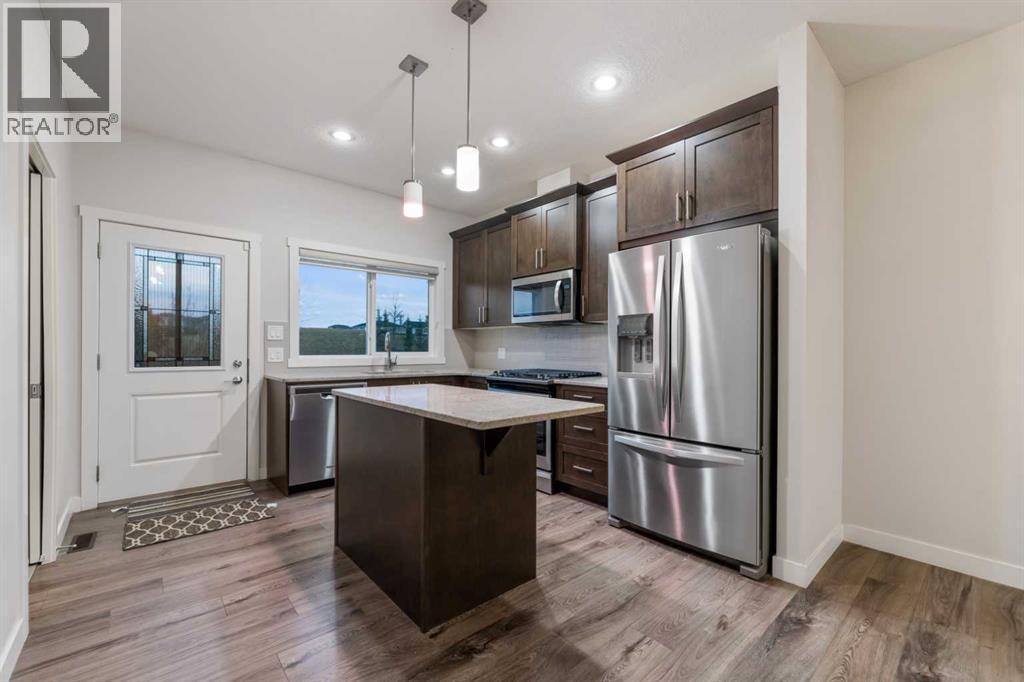 29 Saddlestone Link Ne, Calgary, Alberta  T3J 2B6 - Photo 9 - A2271665