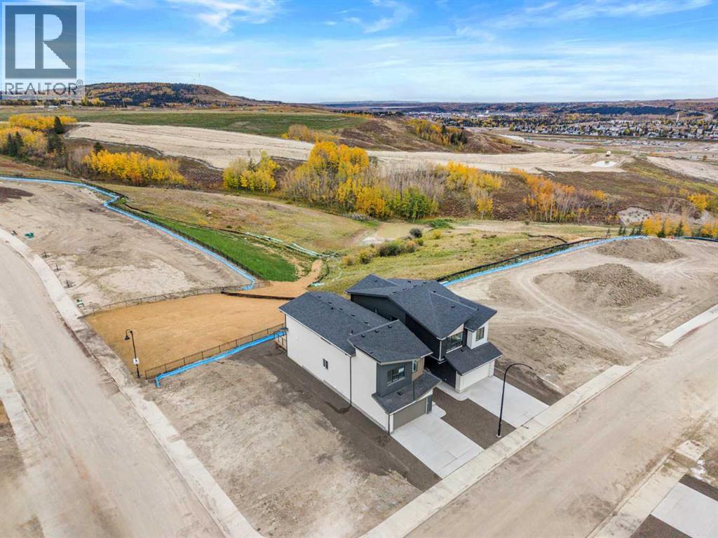 47 Heritage Heath, Cochrane, Alberta T0T 0T0 - Photo 7 - A2262943