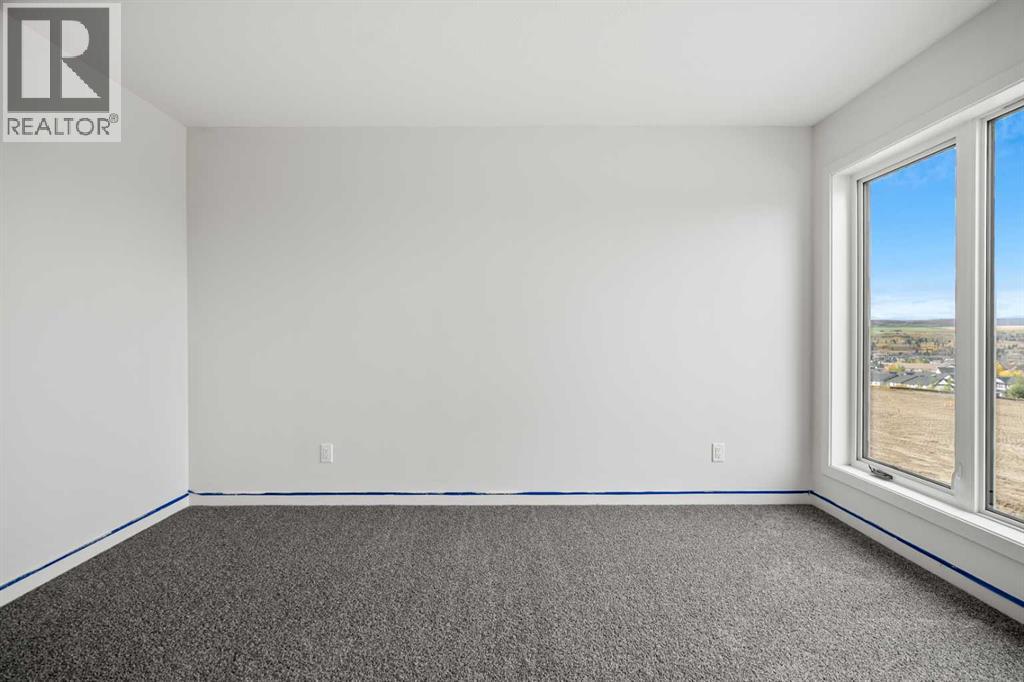 50 Heritage Heath, Cochrane, Alberta  T0T 0T0 - Photo 30 - A2262939