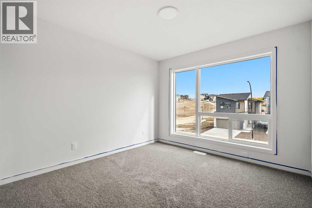 50 Heritage Heath, Cochrane, Alberta  T0T 0T0 - Photo 37 - A2262939