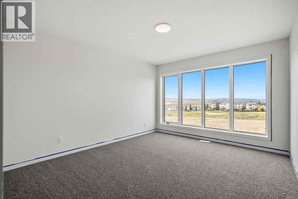 50 Heritage Heath, Cochrane, Alberta  T0T 0T0 - Photo 27 - A2262939