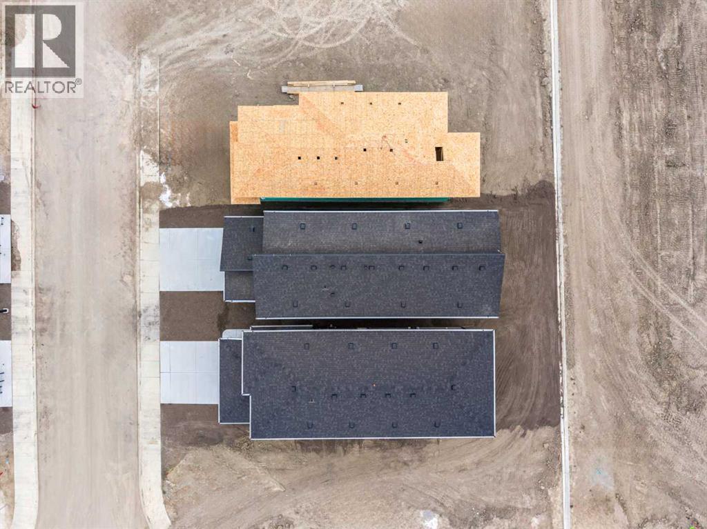 50 Heritage Heath, Cochrane, Alberta  T0T 0T0 - Photo 3 - A2262939